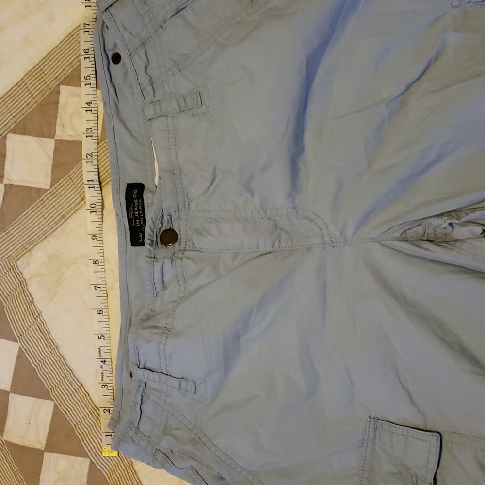 Like new. Pockets front,back and legs